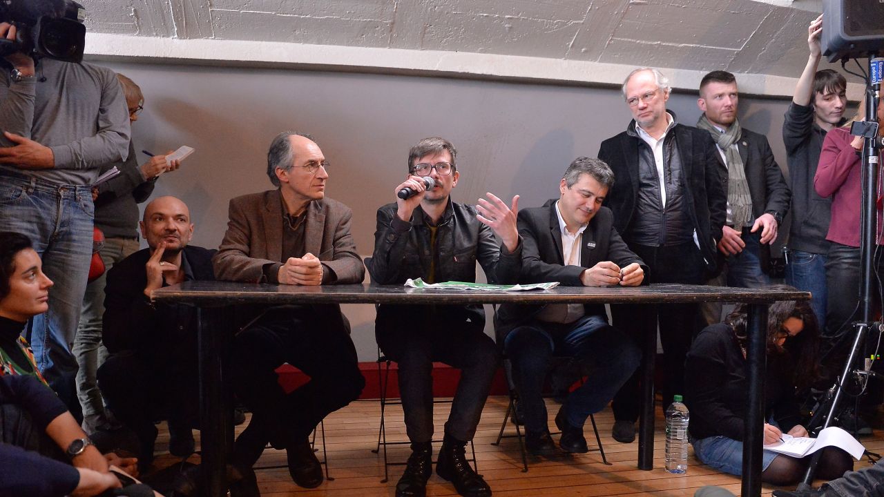 PARIS, FRANCE - JANUARY 13:Charlie Hebdo lawyer, Richard Malka (L), Charlie Hebdo editor in chief,  Gerard Briard (2L) Charlie Hebdo cartoonist, Renald Luzier (C) aka Luz, Patrick Pelloux (3R), Charlie Hebdo journalist and the President of Liberation, Laurent Joffrin (2R) during the Charlie Hebdo press conference held at the Liberation offices in Paris on January 13, 2015 in Paris, France.  The press conference was held to accounce the next issue following the terrorist attack last Wednesday against Charlie Hebdo where 12 people were killed.  (Photo by Aurelien Meunier/Getty Images)