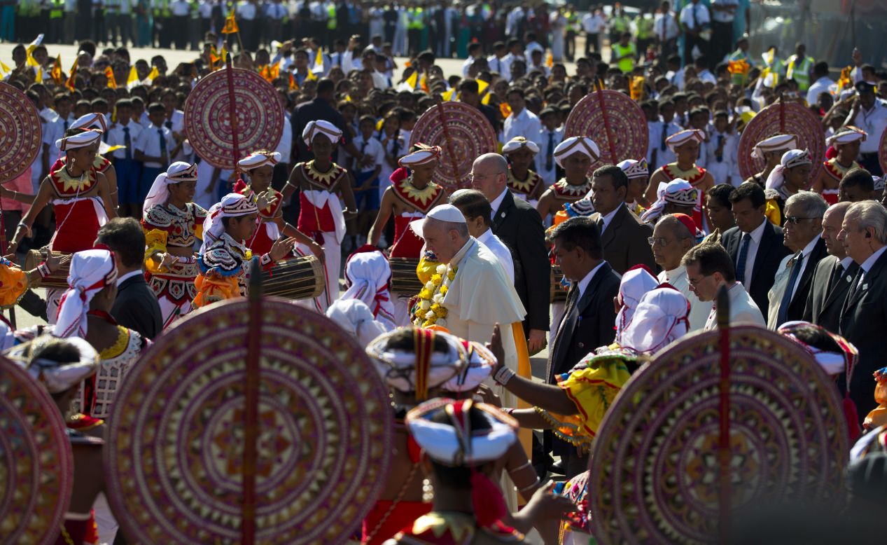 Pope Francis is received by colorful Sri Lankan dancers upon arrival in the capital Colombo on January 13.