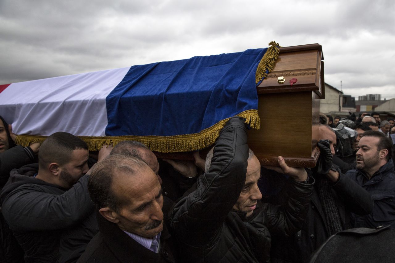 The funeral for police officer Ahmed Merabet takes place in Bobigny, France, on January 13. He helped pursued the attackers who opened fire at the Paris office of Charlie Hebdo magazine.