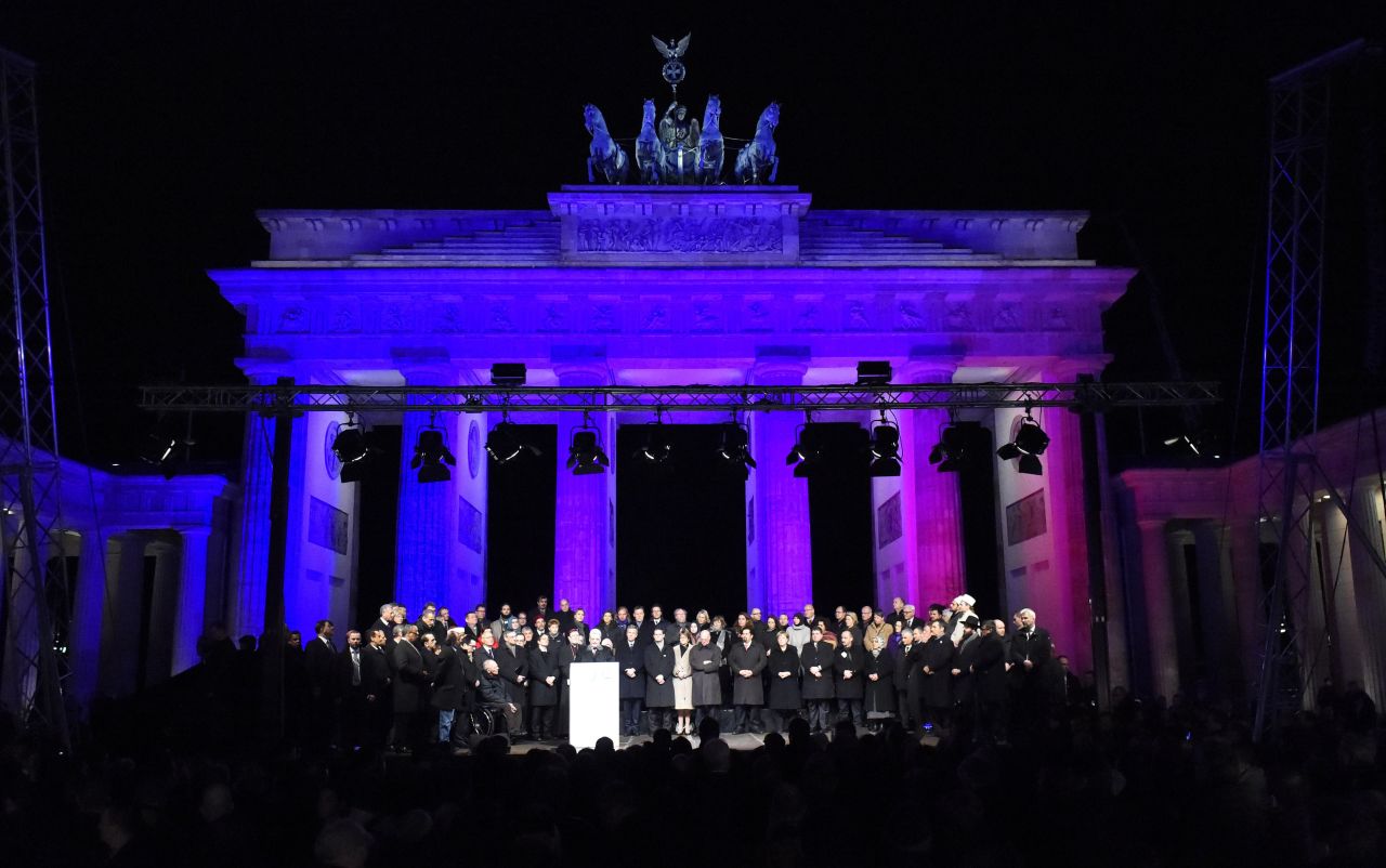 German President Joachim Gauck gives a speech in front of Berlin's Brandenburg Gate as political and religious leaders attend a Muslim rally to condemn the Paris terror attacks, promote tolerance and send a rebuke to a growing anti-Islamic movement on Tuesday, January 13.