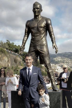 December 21: Ronaldo -- with son, Cristiano Jr. -- attends the unveiling of a statue of himself in his hometown of Funchal.