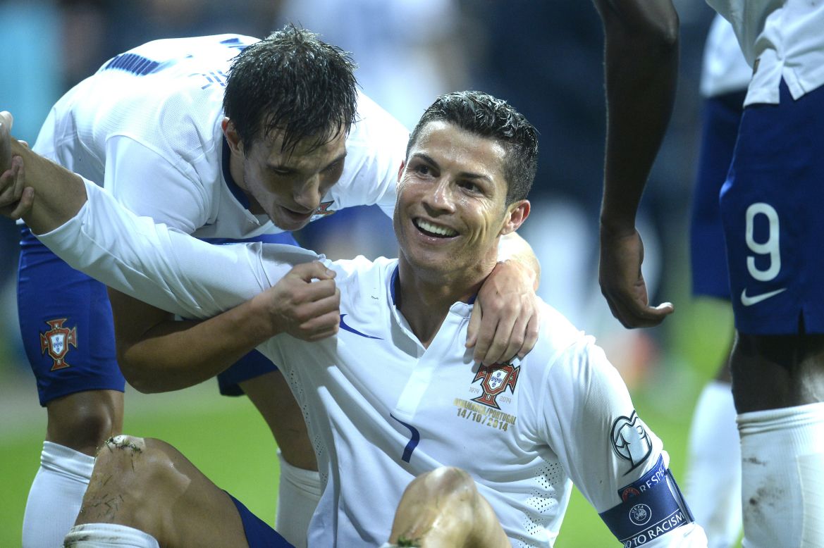 October 14: Ronaldo reacts after scoring during a UEFA qualifying match versus Denmark, becoming the joint all-time scorer in the competition. 