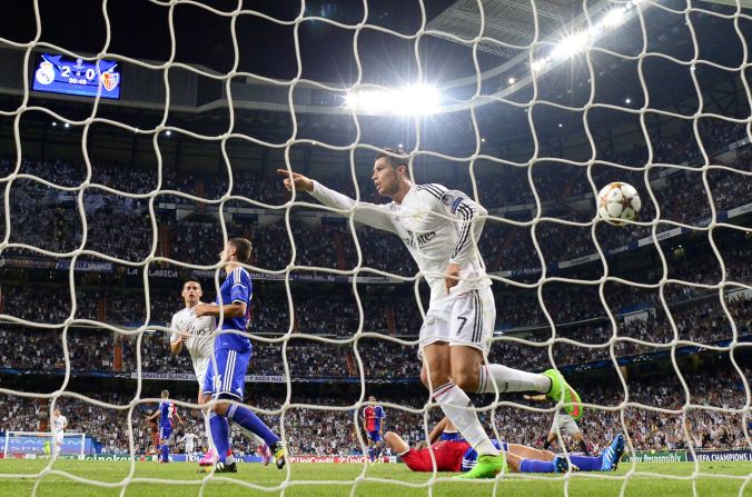 September 16: Ronaldo celebrates after scoring Madrid's third goal during the team's opening of its Champions League defense against Basel 1893.