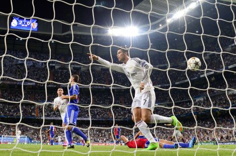 September 16: Ronaldo celebrates after scoring Madrid's third goal during the team's opening of its Champions League defense against Basel 1893.