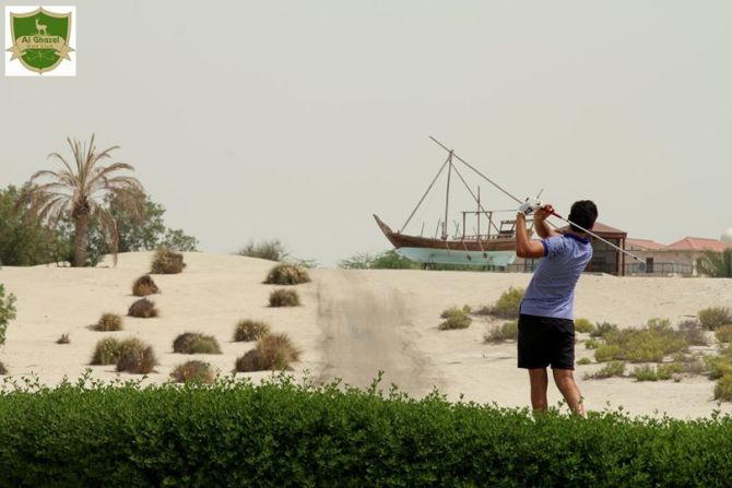 A player takes aim on the Al Ghazal course in Abu Dhabi, regarded by some experts as a world class sand course.
