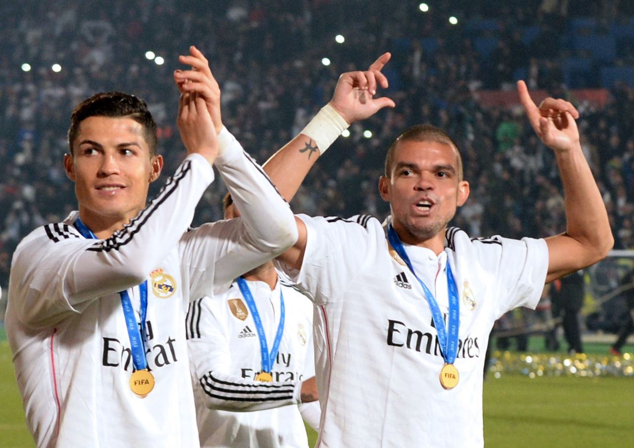 December 20: Ronaldo (L) and compatriot and teammate Pepe (R) salute their supporters after winning the FIFA Club World Cup final match against San Lorenzo in Morocco to cap off a hugely successful 2014.