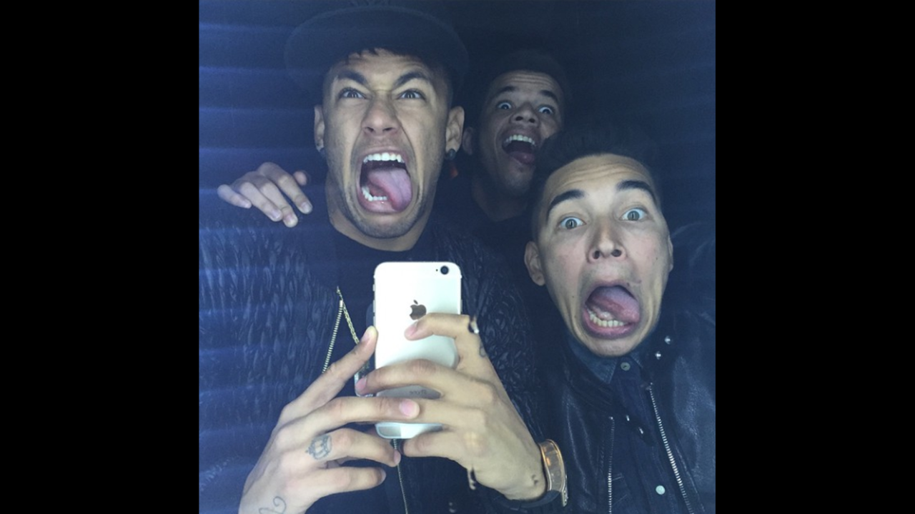 Brazilian soccer star Neymar, left, makes a silly face with friends in this selfie <a href="http://instagram.com/p/xpgFxtRtpO/?modal=true" target="_blank" target="_blank">he uploaded to Instagram</a> on Friday, January 9.