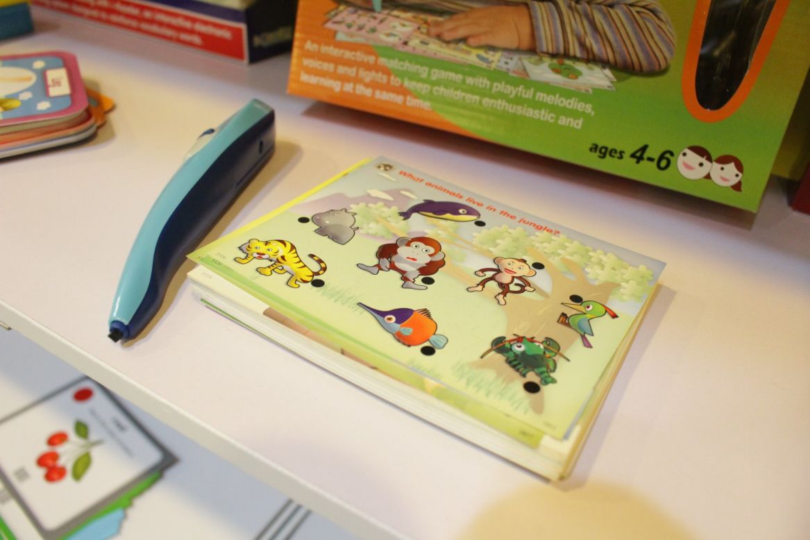 One of the electronic toys on display is the talking pen -- the user touches a word in a book with the pen, which then clearly pronounces the word.