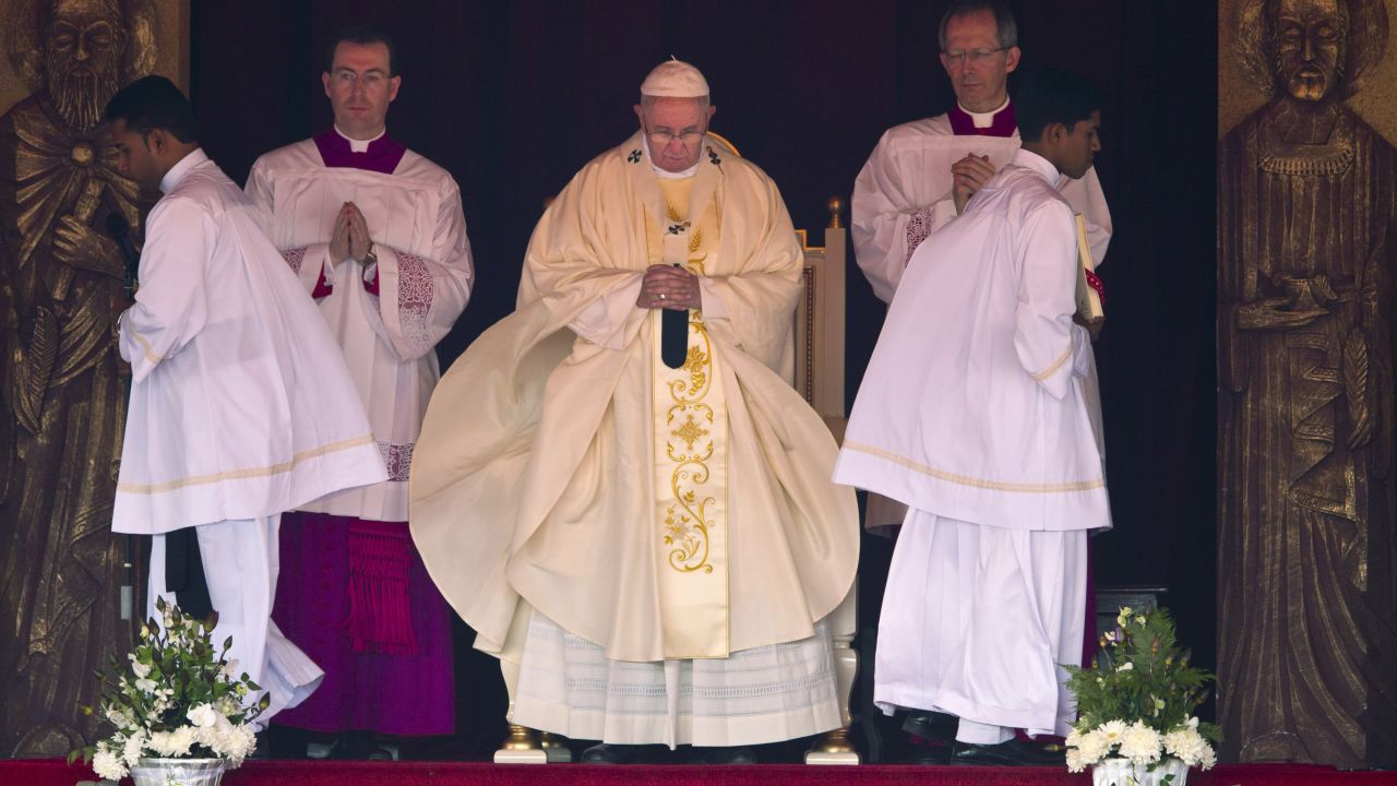 Pope Francis stands during Mass in Colombo on January 14.