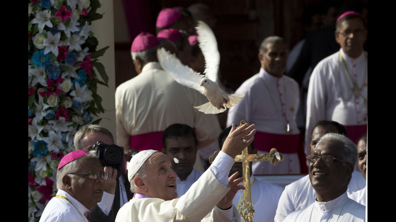 Pope Francis frees a dove in Madhu, Sri Lanka, on January 14. The pontiff preached reconciliation for the war-divided nation.