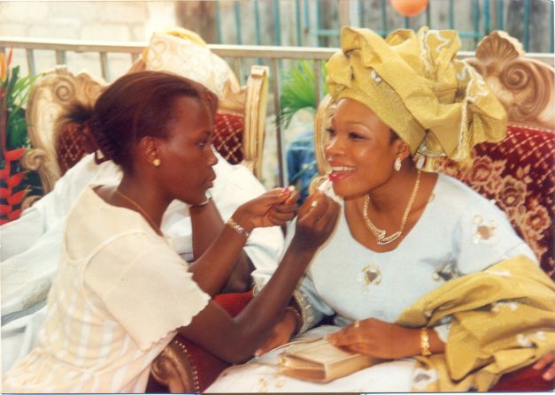 She got her first break when a friend -- the daughter of the chief of Nigeria's naval staff -- graduated and got married (pictured). Investing in a $100 kit, she provided make up for the bridal party. 