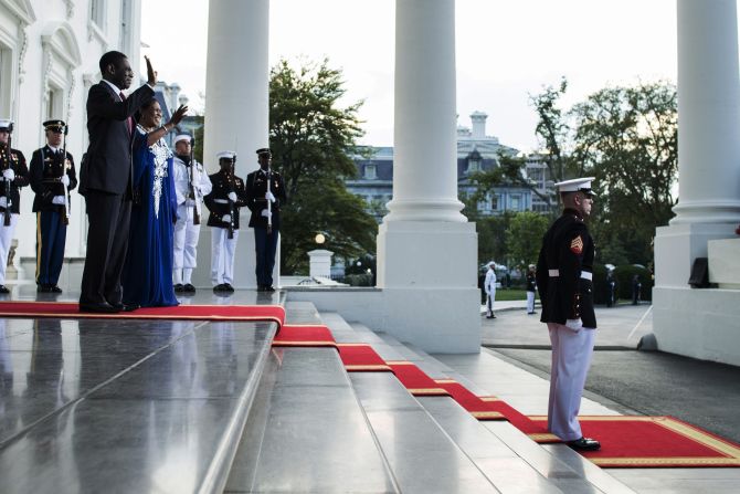 Obiang poses with his wife on the steps of the White House in August 2014, during the U.S.-Africa Leaders Summit. 