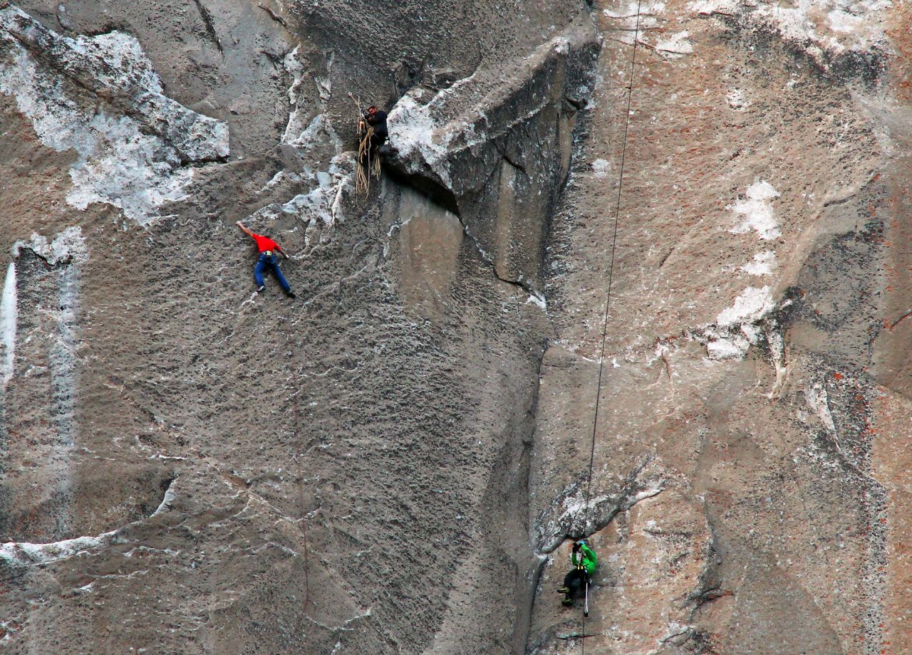 Caldwell, in red, climbs while cameramen record him on Thursday, January 8.