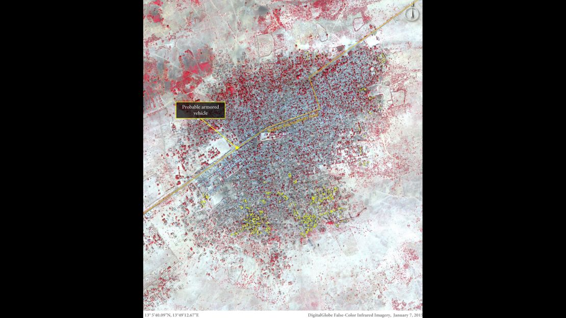This image shows more than 620 damaged or destroyed structures, represented by yellow dots, predominantly located in the southern portion of Baga on January 7. Amnesty International says vehicle activity is present along the main road, possibly including an armored vehicle stationed at a roadblock close to the center of town.