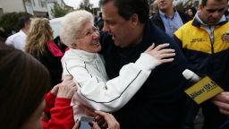 New Jersey Gov. Chris Christie (R) hugs Angela Cimillo of Moonachie, New Jersey whose home was damaged by Superstorm Sandy November 1, 2012 in Moonachie, New Jersey. With the death toll currently over 70 and millions of homes and businesses without power, the US east coast is attempting to recover from the effects of floods, fires and power outages brought on by Superstorm Sandy.
