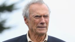 PEBBLE BEACH, CA - FEBRUARY 09: Clint Eastwood stands on the 18th green during the final round of the AT&T Pebble Beach National Pro-Am at the Pebble Beach Golf Links on February 9, 2014 in Pebble Beach, California. (Photo by Christian Petersen/Getty Images)