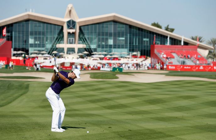 First round leader Kaymer plays his approach shot to the ninth on the way to his eight-under-par 64  