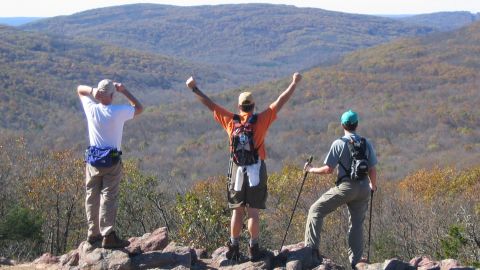  Hikers Jeff Wickenhauser, Randy Yeck and Steve Coates, from left, enjoy the beauty along the Ozark Trail at Taum Sauk Mountain in Missouri in fall 2004. (AP Photo/Kansas City Star, Lee Meyer)