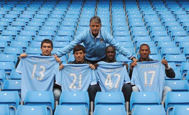 Shortly after the World Cup he was among a raft of new signings under Roberto Mancini for Manchester City. Toure was unveiled alongside Aleksandar Kolarov, David Silva and Jerome Boateng.