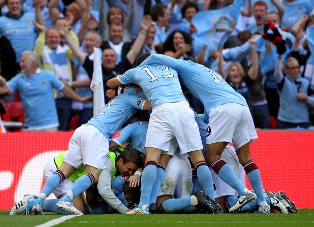 Manchester City's litany of stars initially took time to settle as a group before the first trophy success came in the 2011 FA Cup final. Toure was mobbed by his teammates after scoring the only goal of the game against Stoke.