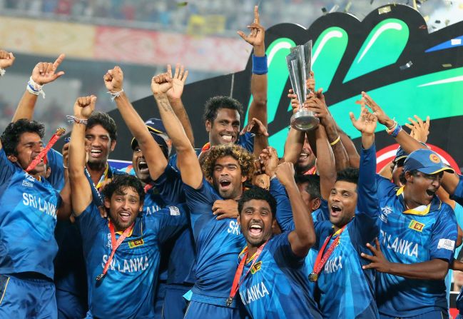 The shortened form of cricket that encourages batters to hit big has drawn large crowds. Here Lasith Malinga of Sri Lanka and his team celebrate winning the 2014 World Cup trophy in Dhaka, Bangladesh.