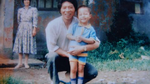 Sun Bin when he was four with his father.  