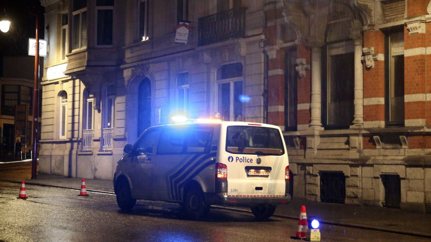 Police set a large security perimeter around 6 Colline street in the city center of Verviers, eastern Belgium, where three people were reportedly killed in an anti-terrorism operation on January 15, 2015. Belgian police launched a "jihadist-related" anti-terrorism operation in the eastern town of Verviers on January 15, with reports saying there were three deaths. Public broadcaster RTBF reported three deaths and said explosions were heard at the scene, but there was no immediate confirmation. The incident comes as Europe is on high alert after 17 people were killed in the Islamist attacks on the Charlie Hebdo magazine and a Jewish supermarket in Paris last week. AFP PHOTO / BELGA / BRUNO FAHY
--BELGIUM OUT--        (Photo credit should read BRUNO FAHY/AFP/Getty Images)