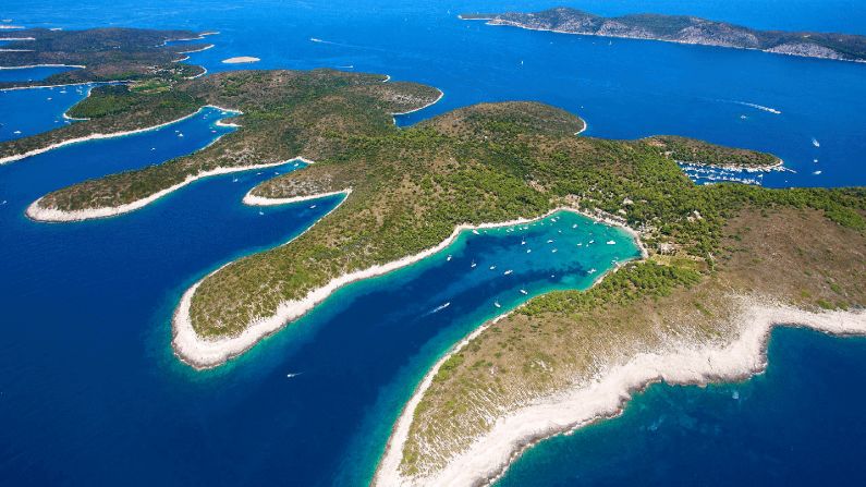 Part of a Croatian marine park, the Kornati Islands are uninhabited except for a few colorful houses. It's a bit like sailing across a desert floating on the sea.