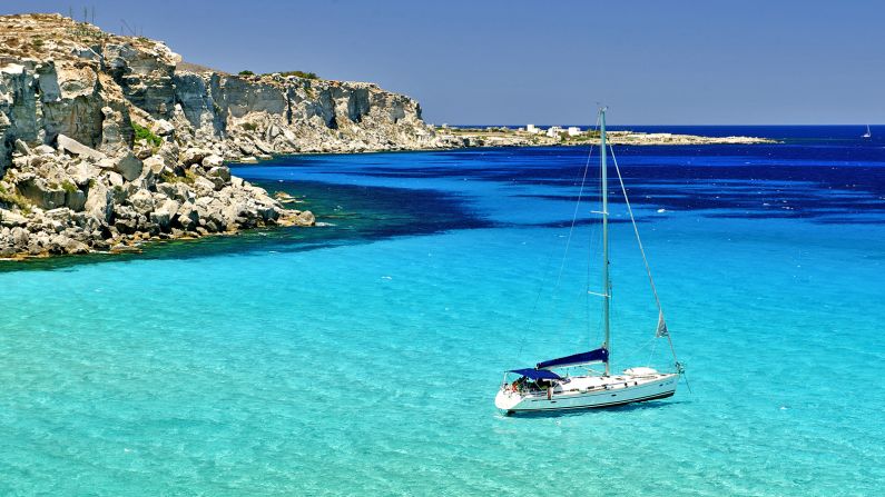 Favignana, the largest of the atolls off Sicily's western coast, is known for deep rocky caves, Roman villas and its Aragonese castle.