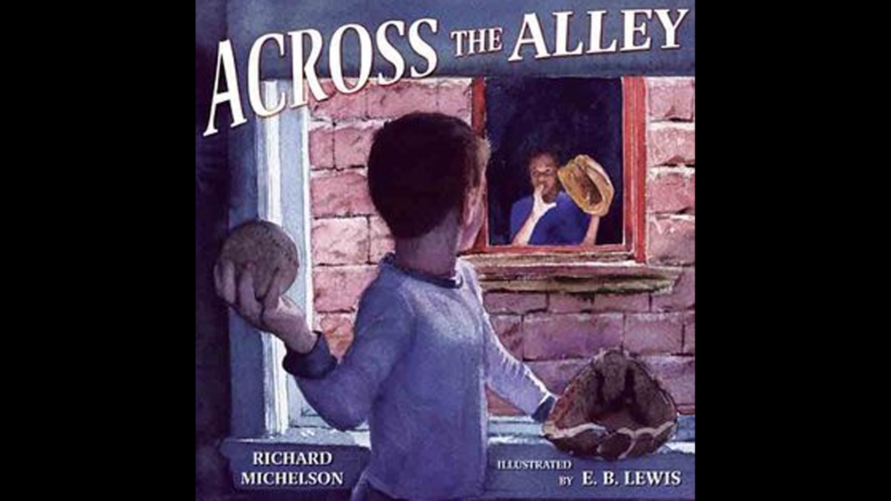 "Across the Alley," written by Richard Michelson and illustrated by E.B. Lewis, tells the story of an African-American child and Jewish child who develop a secret friendship.