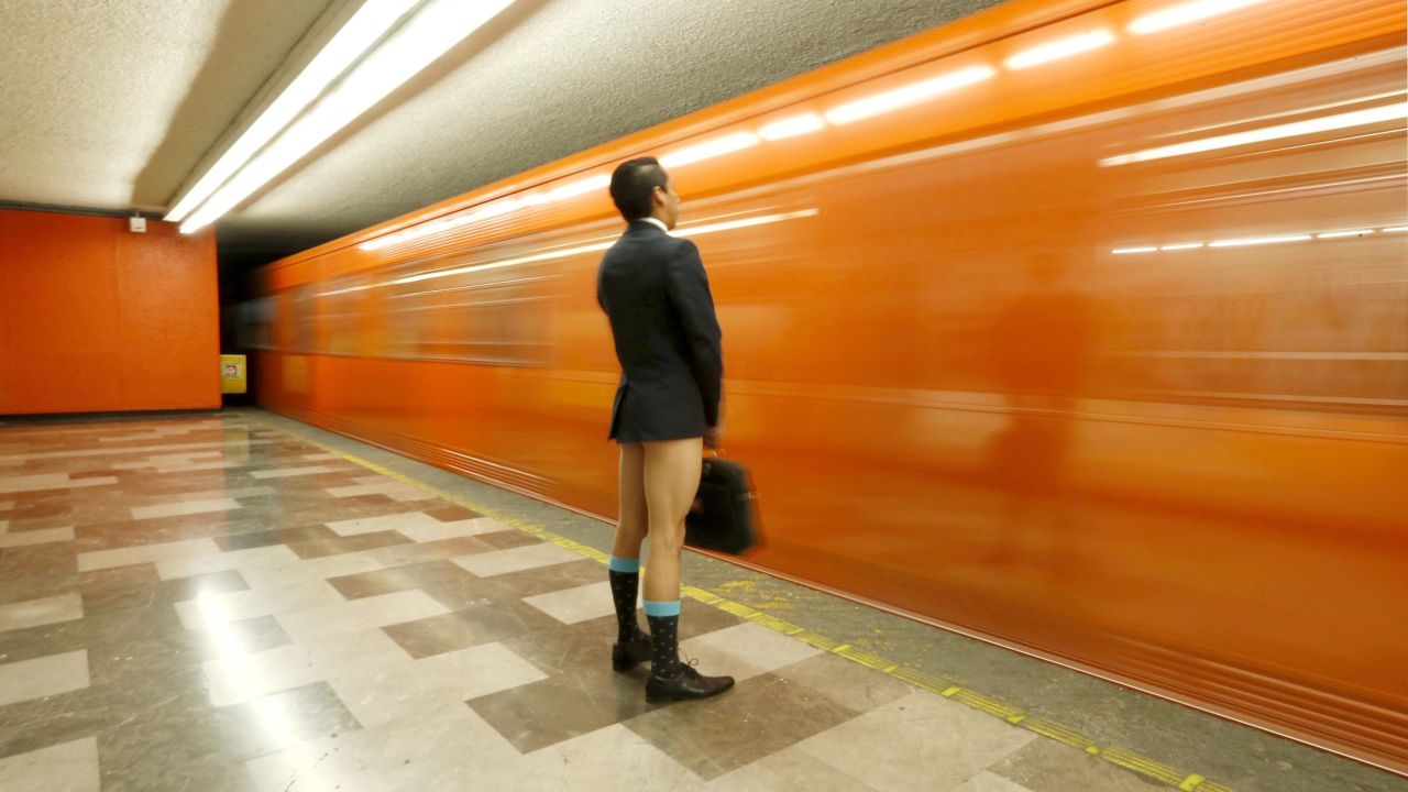 In this long-exposure photo, a traveler without pants waits for a train Sunday, January 11, during the "No Pants Subway Ride" in Mexico City. The annual event also occurs in other cities around the world, including New York.