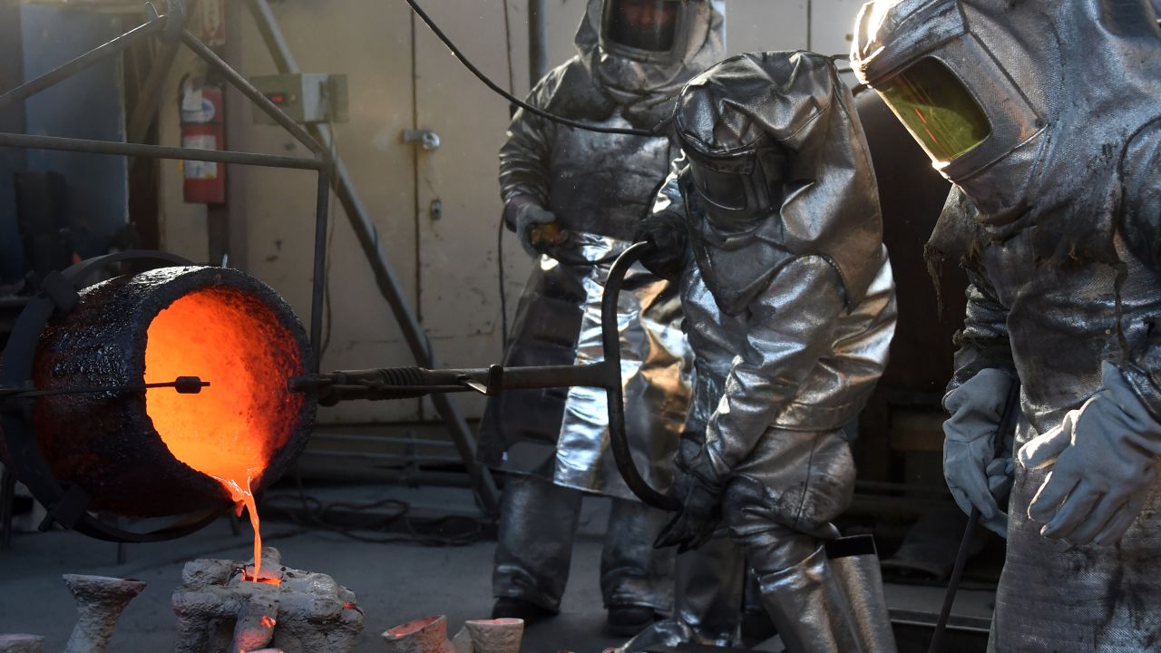 Workers in Burbank, California, pour hot molten bronze on Tuesday, January 13, as they make a statuette for the upcoming Screen Actors Guild Awards.
