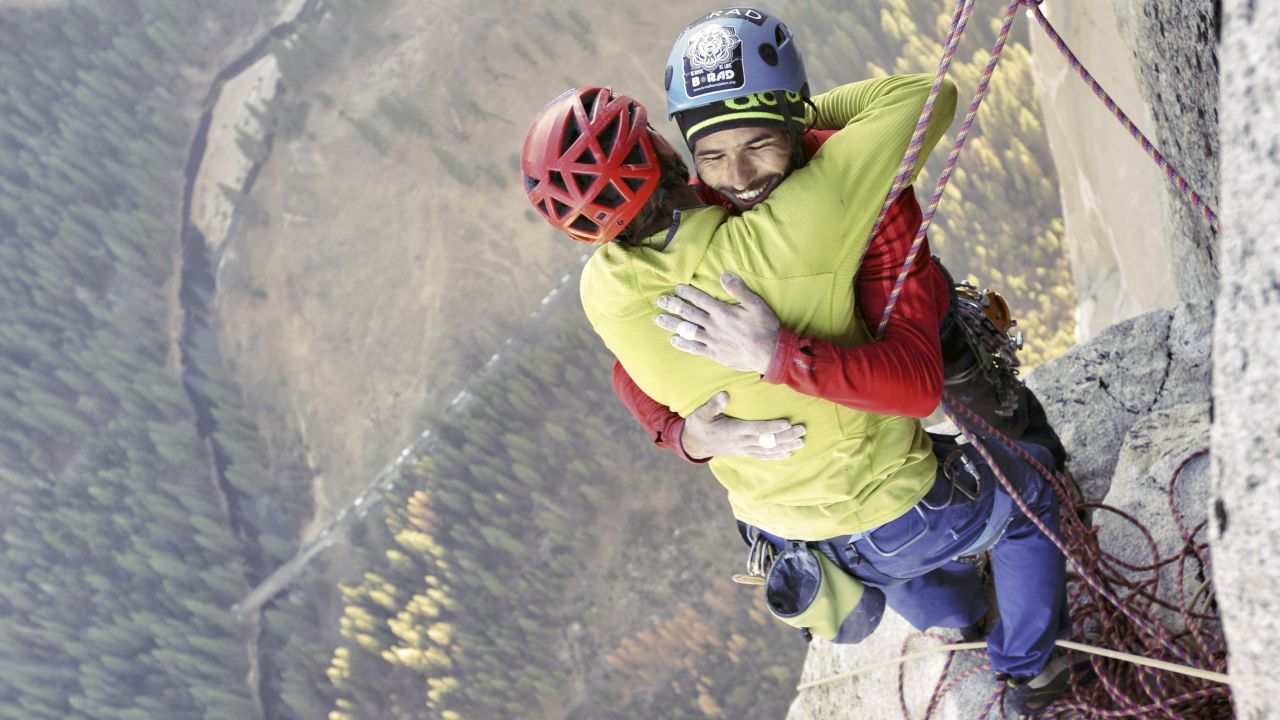 Free climbers Tommy Caldwell, left, and Kevin Jorgeson embrace Wednesday, January 14, after reaching the top of El Capitan, a 3,000-foot rock formation in California's Yosemite National Park. They are <a href="http://www.cnn.com/2015/01/14/travel/gallery/el-capitan-climbers/index.html" target="_blank">the first to successfully climb El Capitan's Dawn Wall</a> using only their hands and feet.