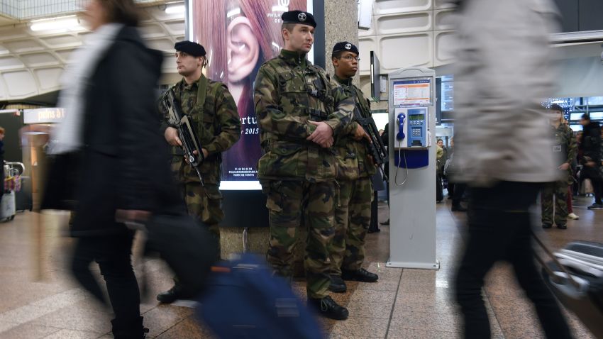 French soldiers patrol at the SNCF railway station La Part-Dieu in Lyon on January 16, 2015 , after France announced an unprecedented deployment of thousands of troops and police to bolster security at "sensitive" sites following last week's jihadist attacks in Paris.       AFP PHOTO / PHILIPPE DESMAZES        (Photo credit should read PHILIPPE DESMAZES/AFP/Getty Images)