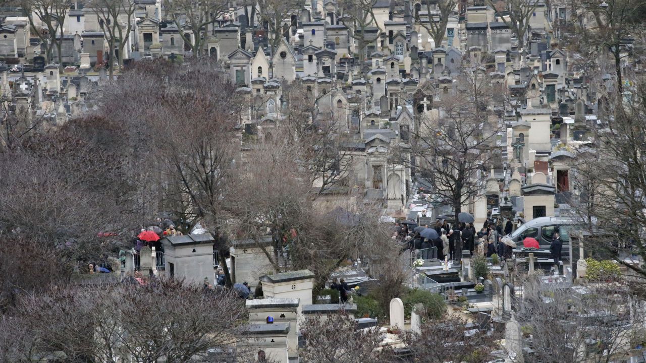 Relatives gather in Paris for the burial of cartoonist Georges Wolinski on January 15.