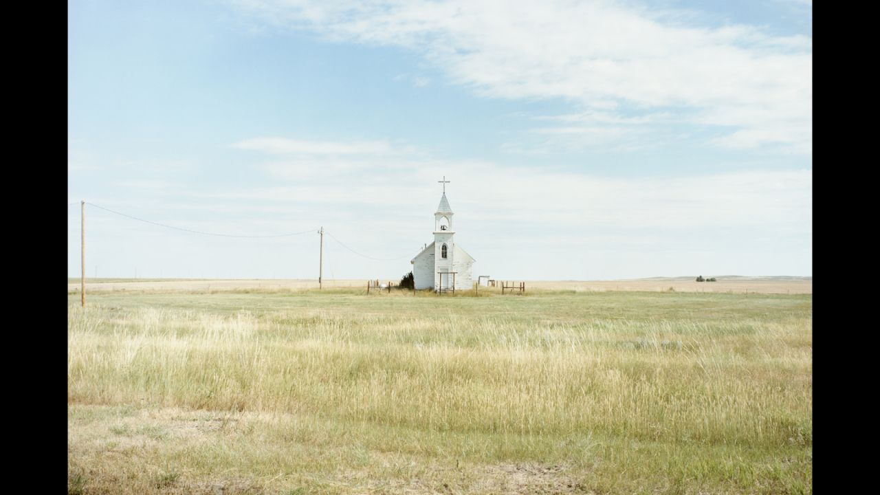 A church stands on the Oglala Sioux Reservation in South Dakota. "When you're traveling 50 miles between almost just a gas station and that's it, it sort of changes one's viewpoint of scale and distance," said Richmond.