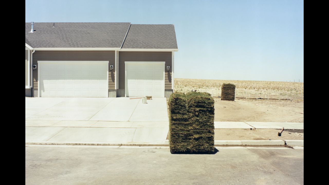Sod is piled outside a home in Santaquin, Utah.