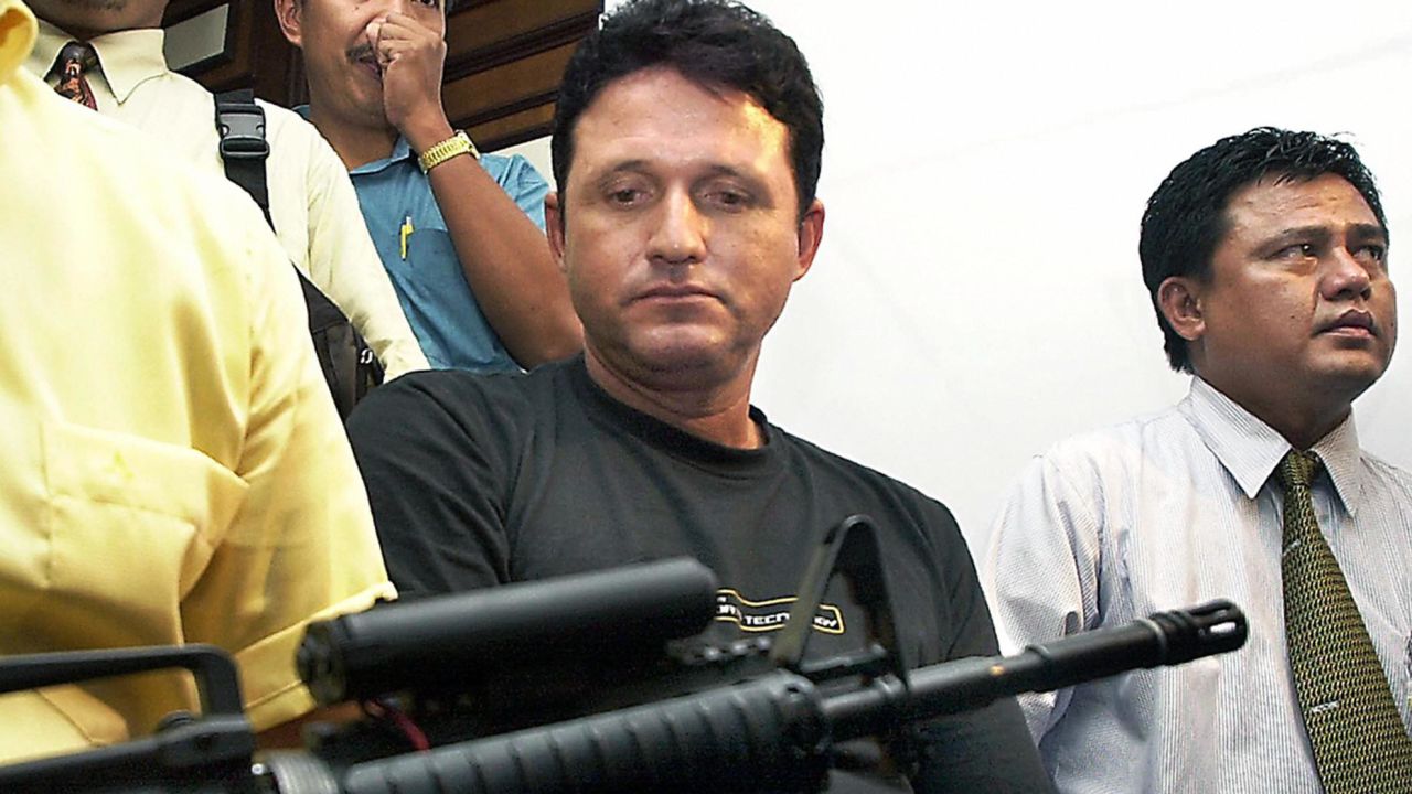 Marco Archer Cardoso Moreira at a press conference in Jakarta after his arrest in August 2003. 