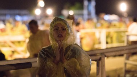 Thousands stood in the rain as the Pope conducted an outdoor Mass