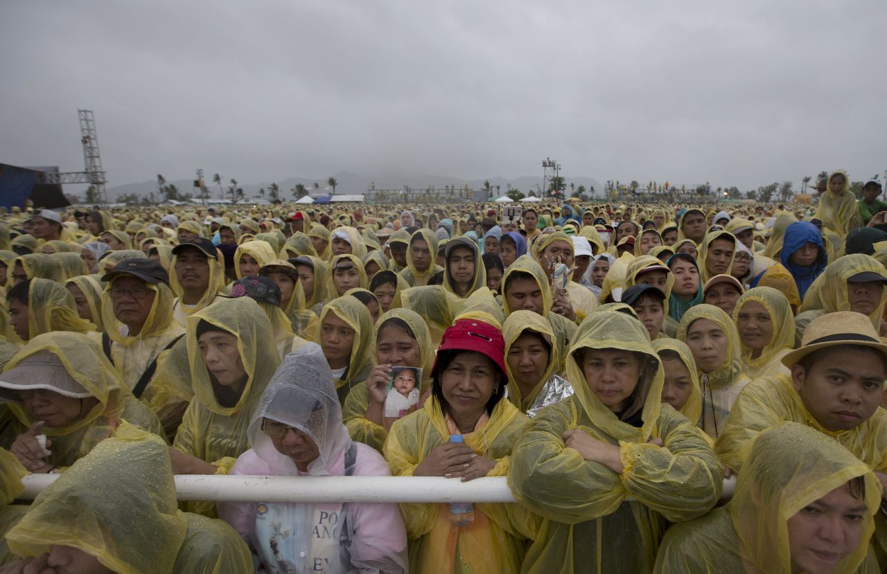 A large crowd of the faithful listens as the pontiff delivers his homily during a Mass in Tacloban, Philippines, on Saturday, January 17.