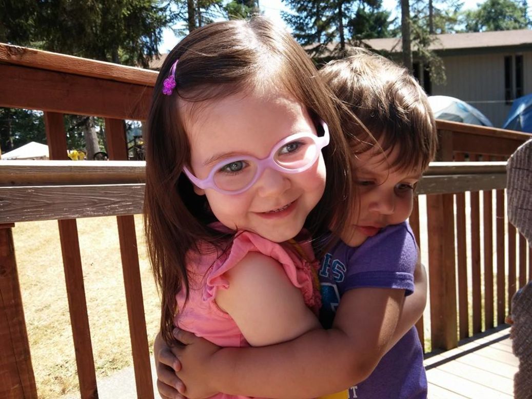 The girls and their families attended Camp Agape, a summer camp for children with cancer.
