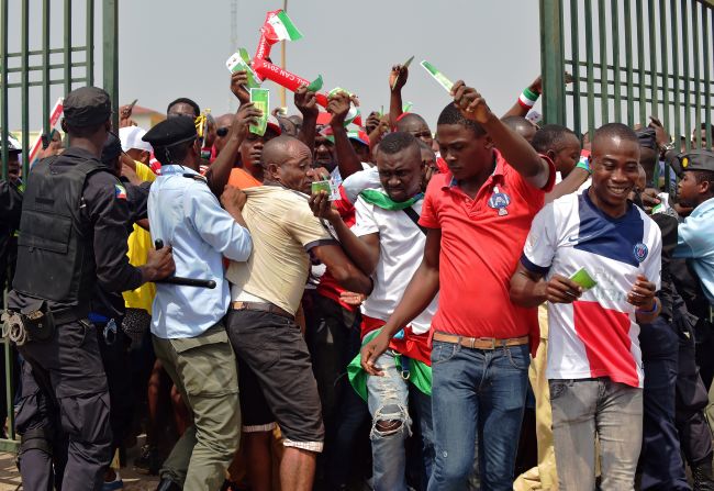 There is a scramble at the gates of the Bata Stadium as fans are eager to see the opening match between hosts Equatorial Guinea and Congo.
