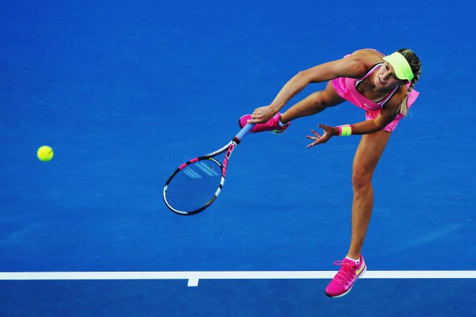 Bouchard, here hitting a kick serve, dispatched Germany's Anna-Lena Friedsam 6-2 6-4.