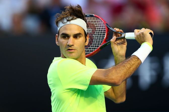 Roger Federer hits a slice against Yen-Hsun Lu. Federer was tested in the third set but prevailed 6-4 6-2 7-5.