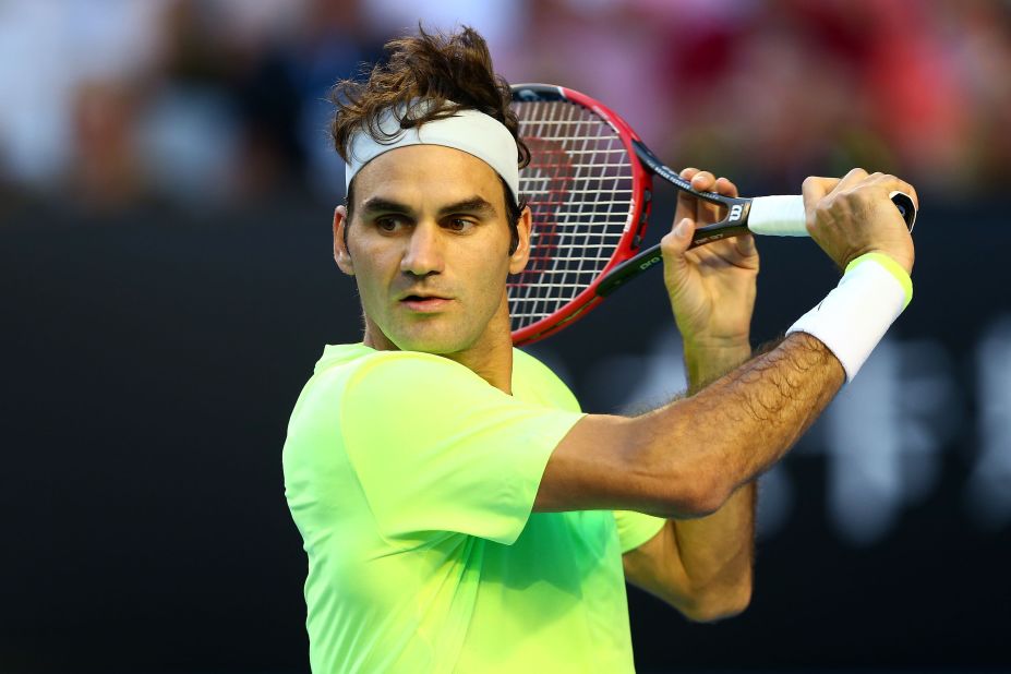 Roger Federer hits a slice against Yen-Hsun Lu. Federer was tested in the third set but prevailed 6-4 6-2 7-5. 