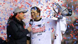 Tom Brady of the New England Patriots holds up the Lamar Hunt Trophy after defeating the Indianapolis Colts in the 2015 AFC Championship Game Sunday in Foxboro, Massachusetts.  
