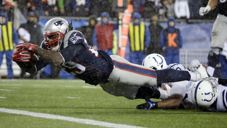 New England running back LeGarrette Blount dives for a touchdown during the AFC Championship on Sunday, January 18. Blount had 148 rushing yards and three touchdowns in the game.