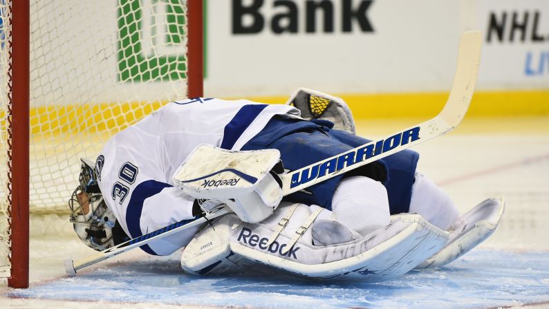 Tampa Bay Lightning goalie Ben Bishop stretches before the start of a game in Boston on Tuesday, January 13.