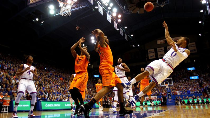 Kansas point guard Frank Mason III falls backward after he was fouled while shooting on Tuesday, January 13. Mason had 16 points and nine rebounds for the Jayhawks, who defeated Oklahoma State 67-57 in Lawrence, Kansas.