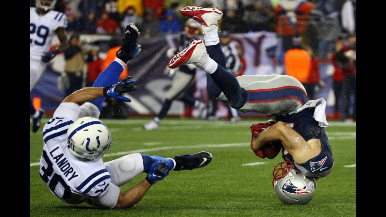 New England wide receiver Julian Edelman flips over after making a catch during the AFC Championship on Sunday, January 18.